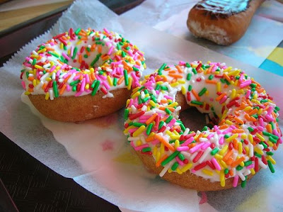 Colorful Chocolate chip Donuts with Sugar frosting base